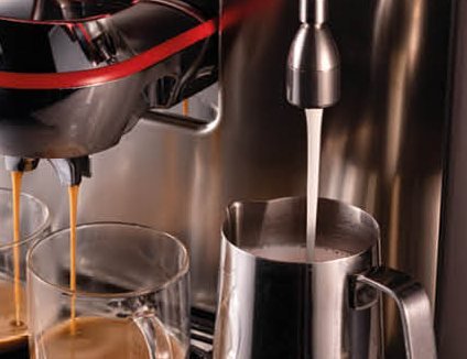 TurboMilk pouring frothed milk into a jug