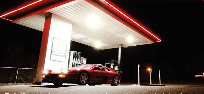 Petrol station forecourt at night
